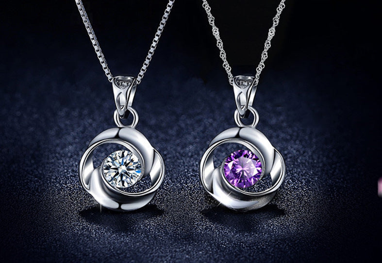 Swirl zircon pendant necklace on silver-tone chain