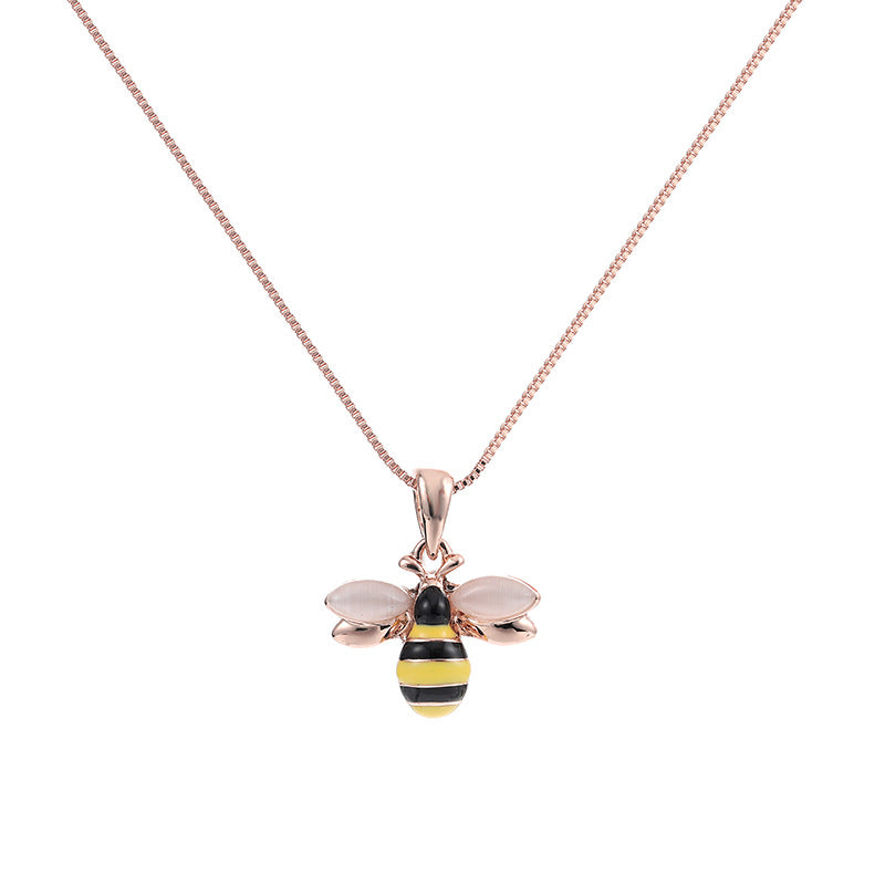 Rose gold-tone necklace with small bee pendant