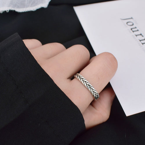 Silver-tone ring with woven braided pattern