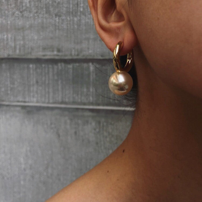 Gold-tone huggie hoops with pearl-style drop