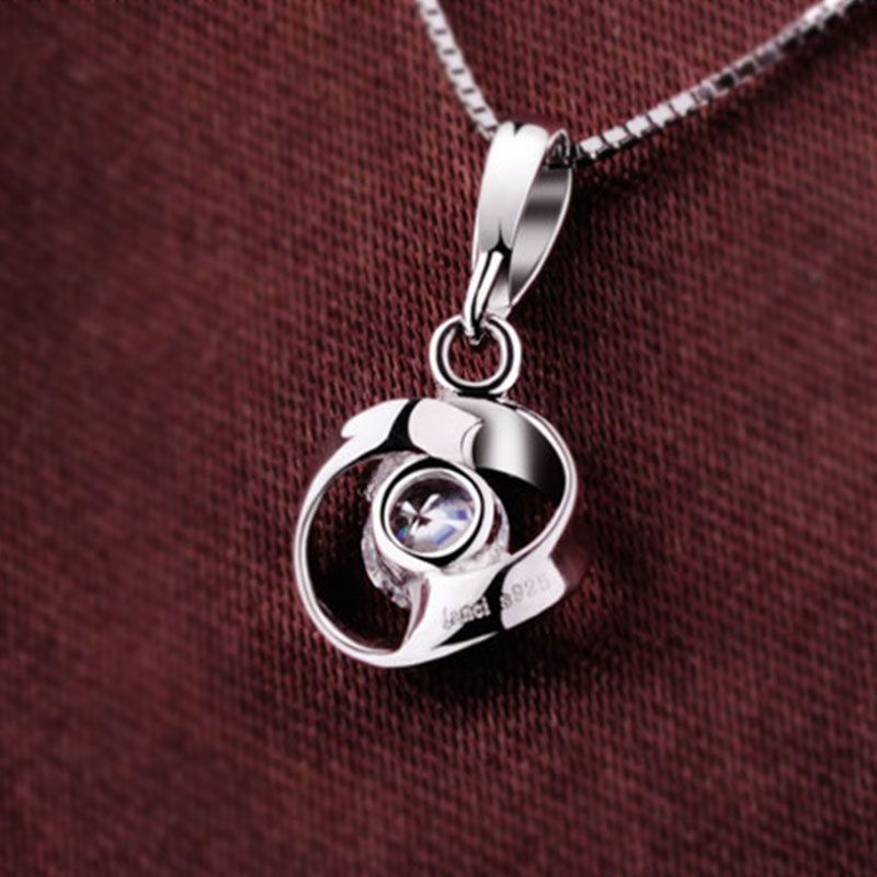 Swirl zircon pendant necklace on silver-tone chain