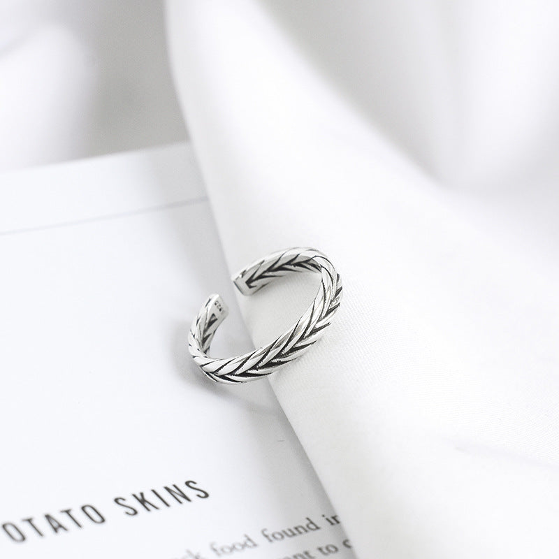 Silver-tone ring with woven braided pattern
