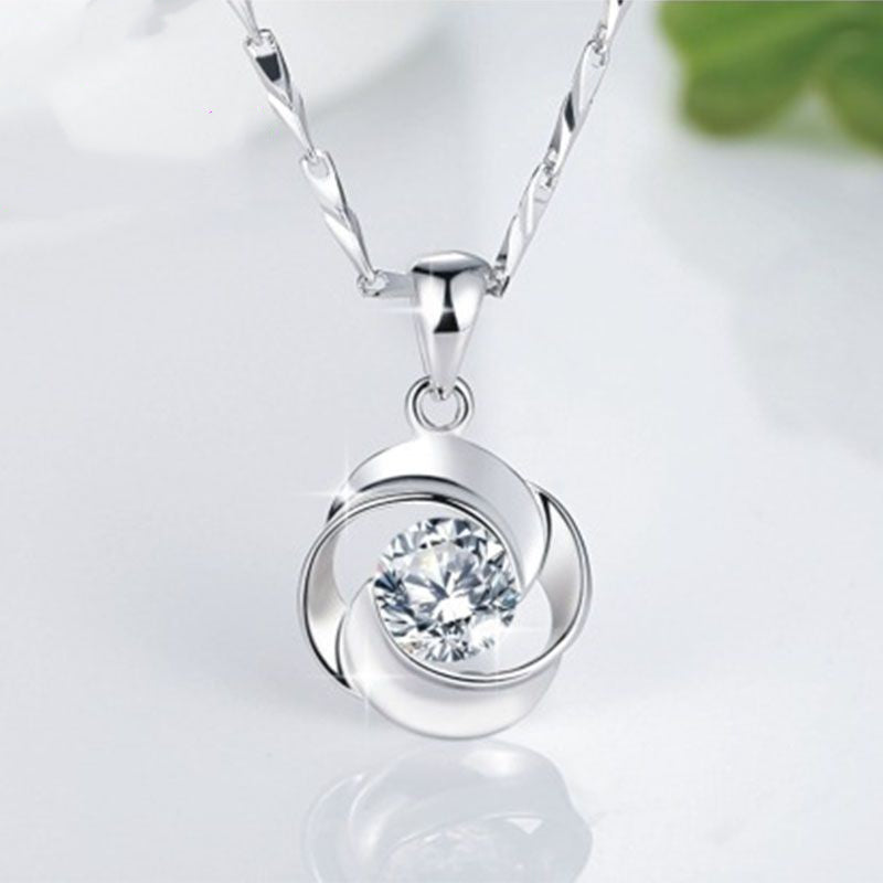 Swirl zircon pendant necklace on silver-tone chain