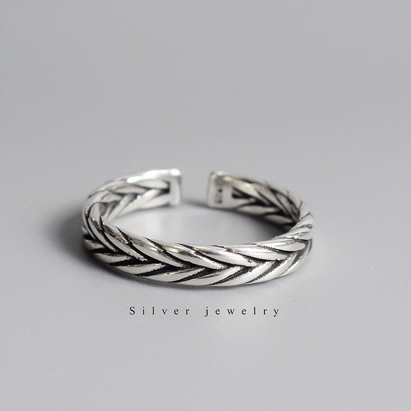 Silver-tone ring with woven braided pattern