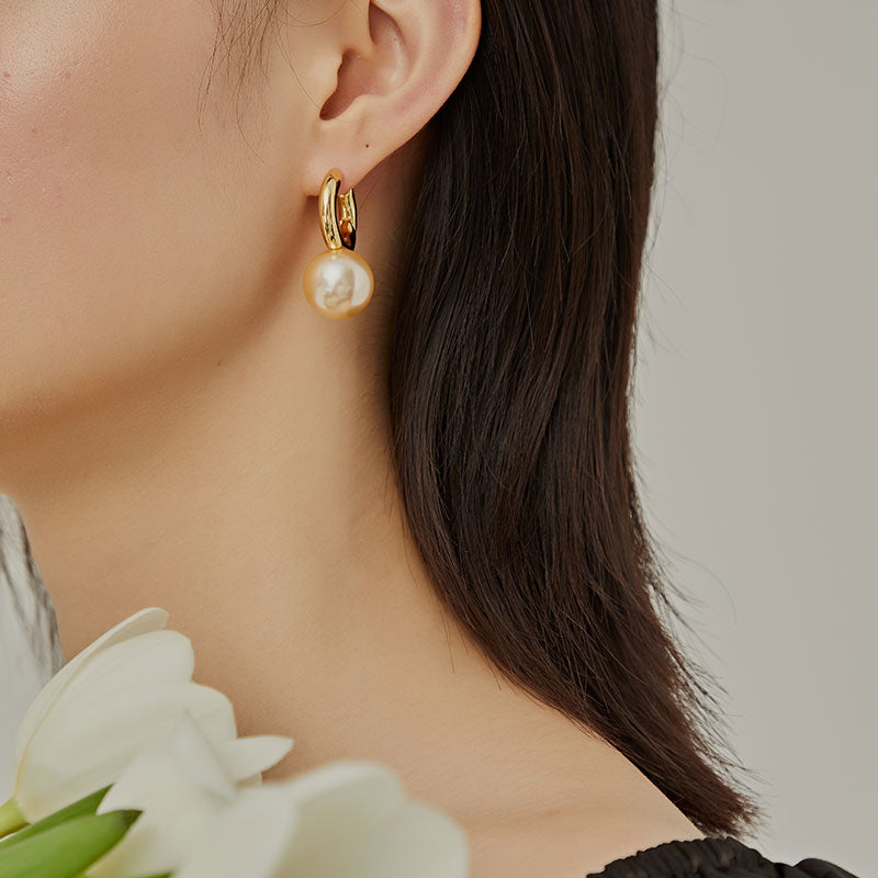 Gold-tone huggie hoops with pearl-style drop